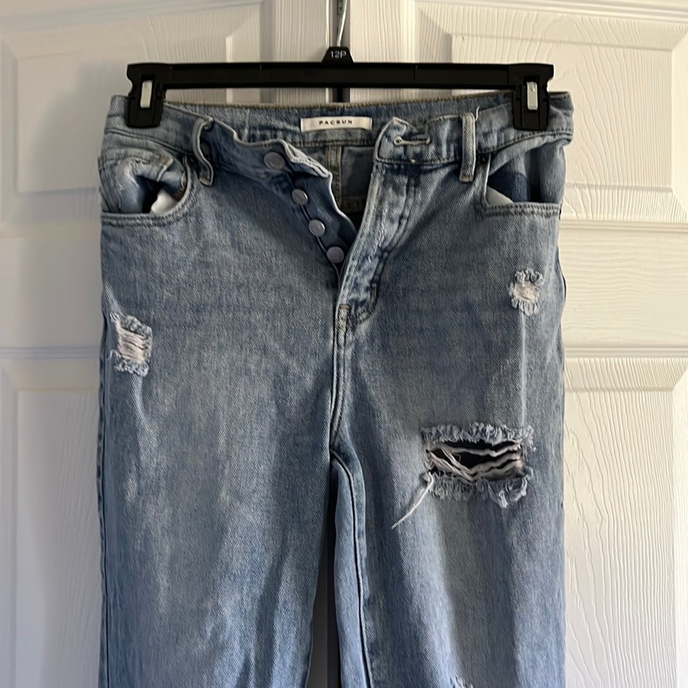 Pacsun light washed distressed denim jeans.